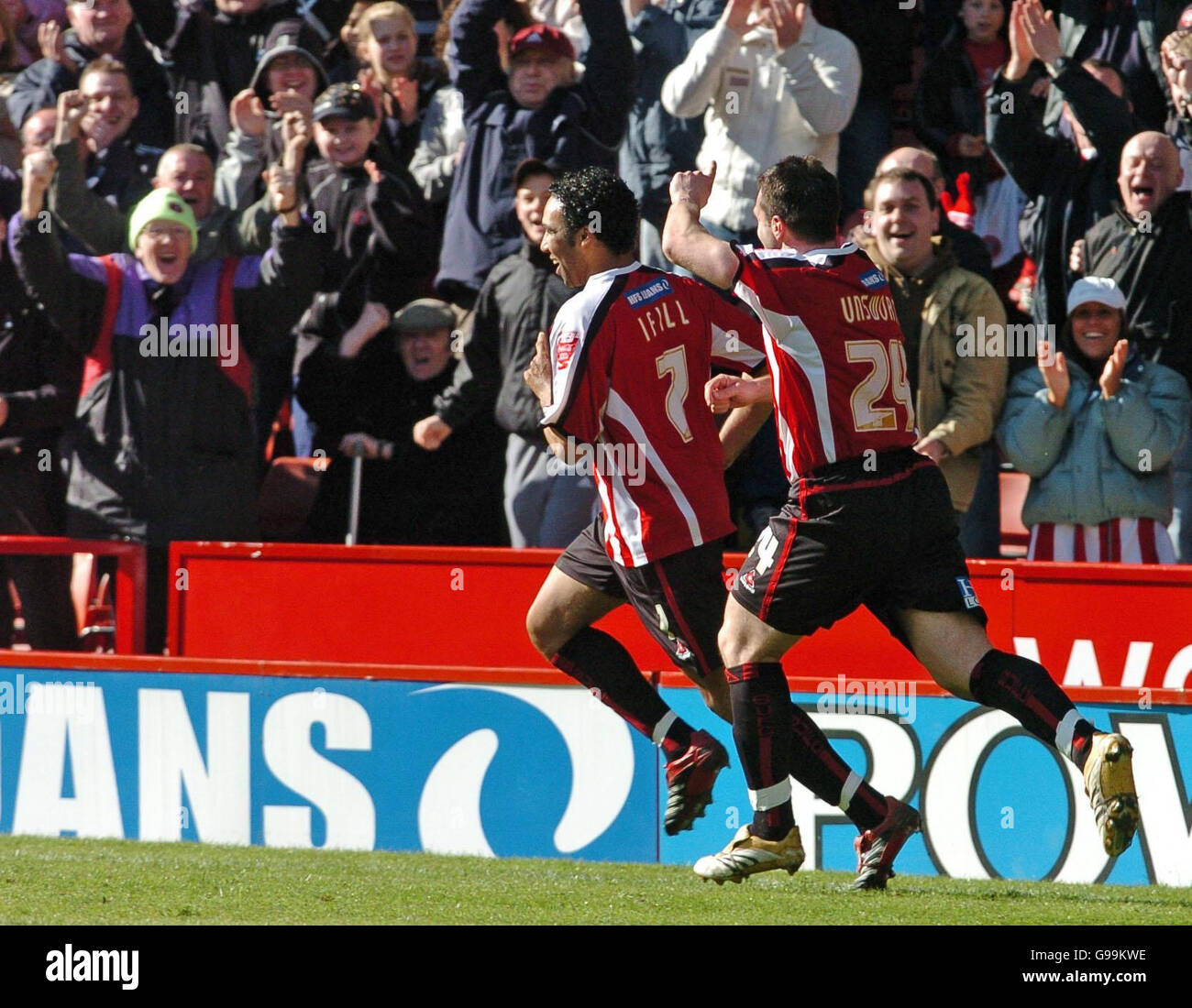 Sheffield United's Paul Ifill (L) celebrates his goal in front of the home fans with David Unsworth during the Coca-Cola Championship match against Hull at Bramall Lane, Sheffield, Saturday April 8, 2006. Stock Photo