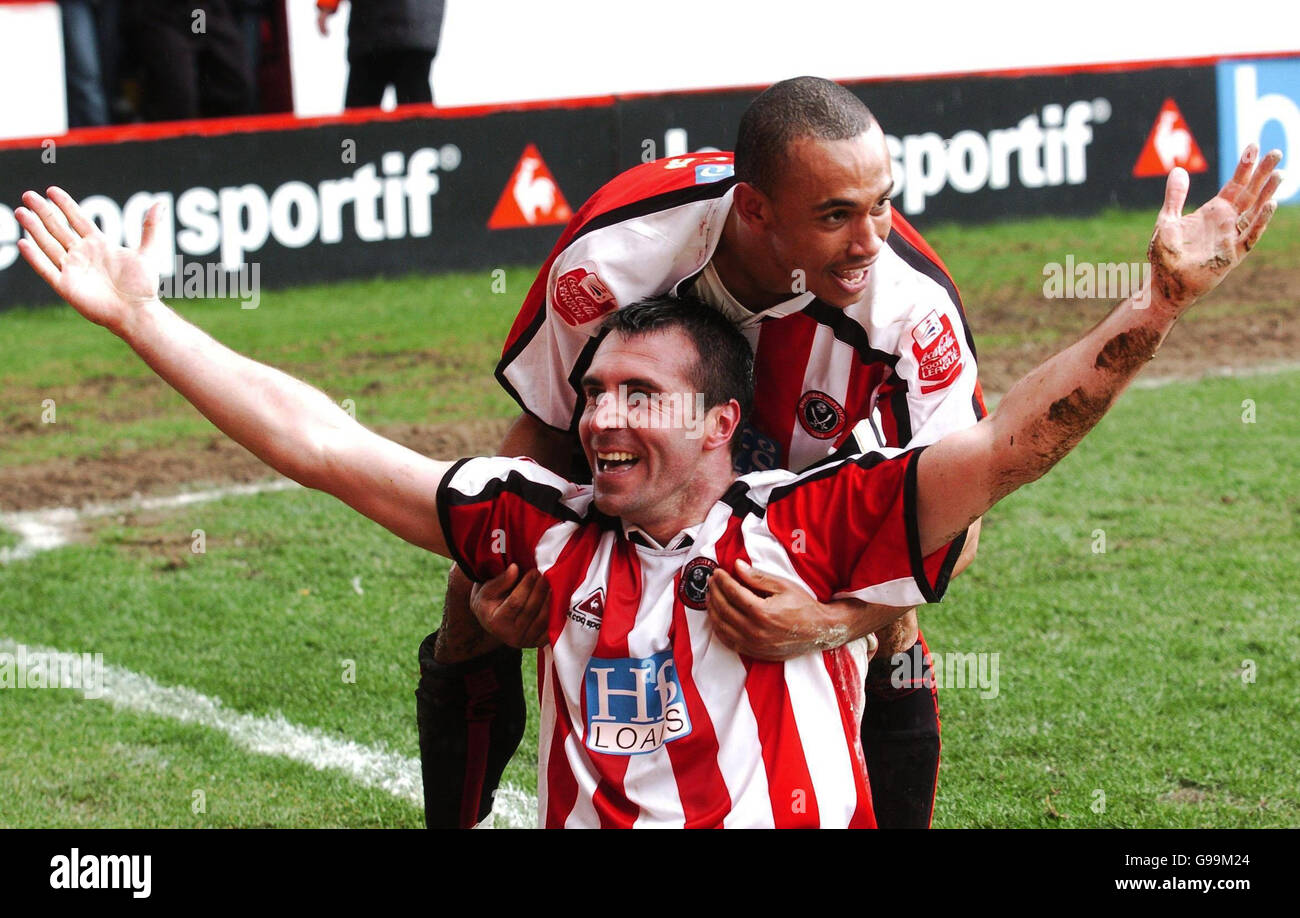 Sheffield United's David Unsworth celebrates his winning goal against Hull City with team-mate Danny Webber (behind) during the Coca-Cola Championship match at Bramall Lane, Sheffield, Saturday April 8, 2006. Stock Photo