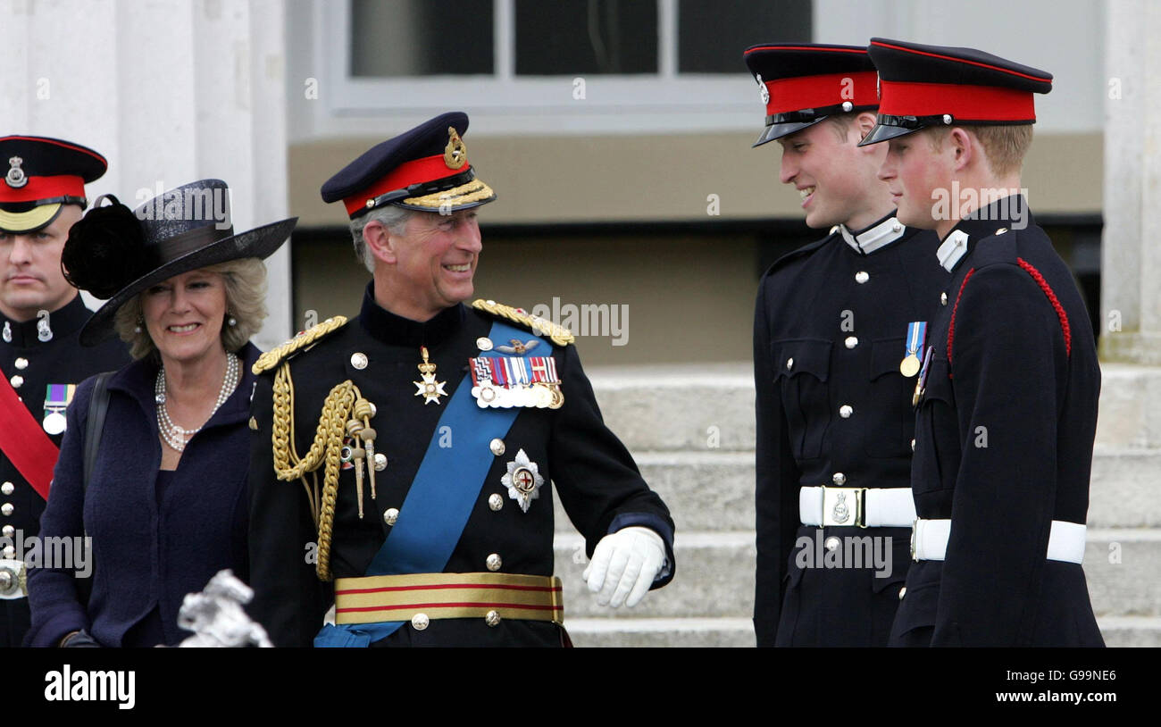 The Prince of Wales and the Duchess of Cornwall speak to Prince William and Prince Harry before leaving Sandhurst Royal Military Academy after The Sovereign's Parade that marked the completion of Prince Harry's Officer training. PRESS ASSOCIATION Photo Picture date: Wednesday April 12, 2006. The Prince was one of 220 cadets passing out and receiving their commissions into the British Army. See PA story ROYAL Harry. Photo credit should read: Tim Ockenden / PA. Stock Photo