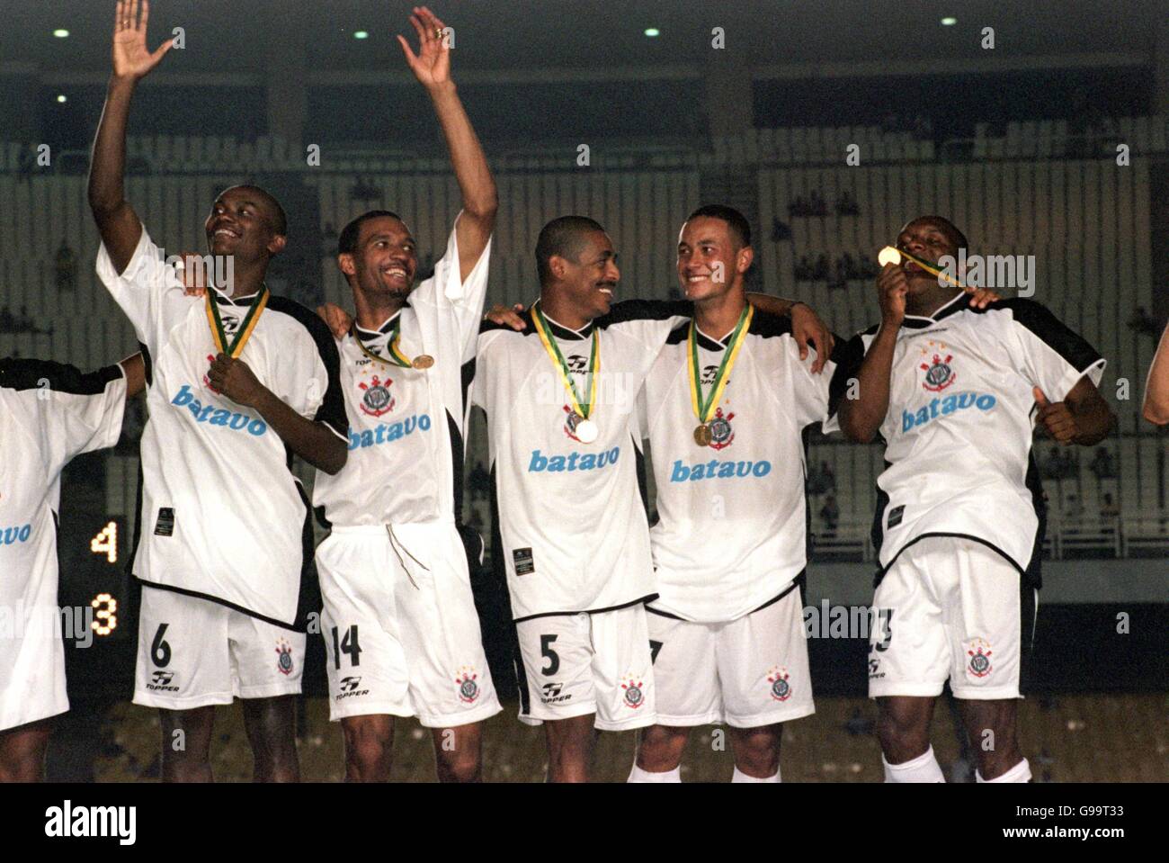 (Left-right) Corinthians' Kleber, Marcio Costa, Vampeta, Fernando Baiano and Gilmar celebrate with their gold medals Stock Photo