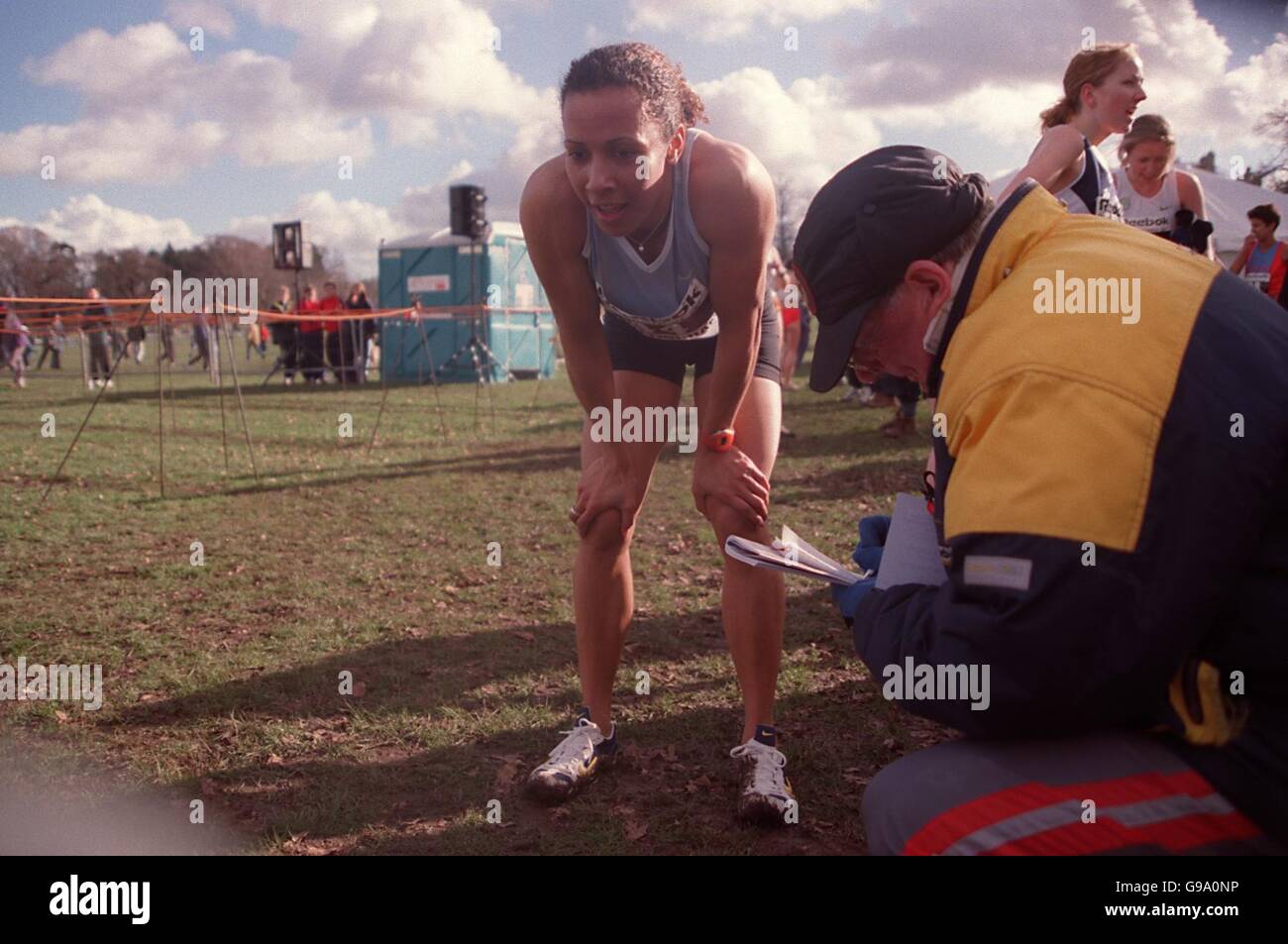Athletics - Inter-Counties Championship/World Cross Country Trials - Nottingham. A relieved Kelly Holmes has her time checked after completing the Women's 4000m cross country course at Wollaton Park, Nottingham Stock Photo