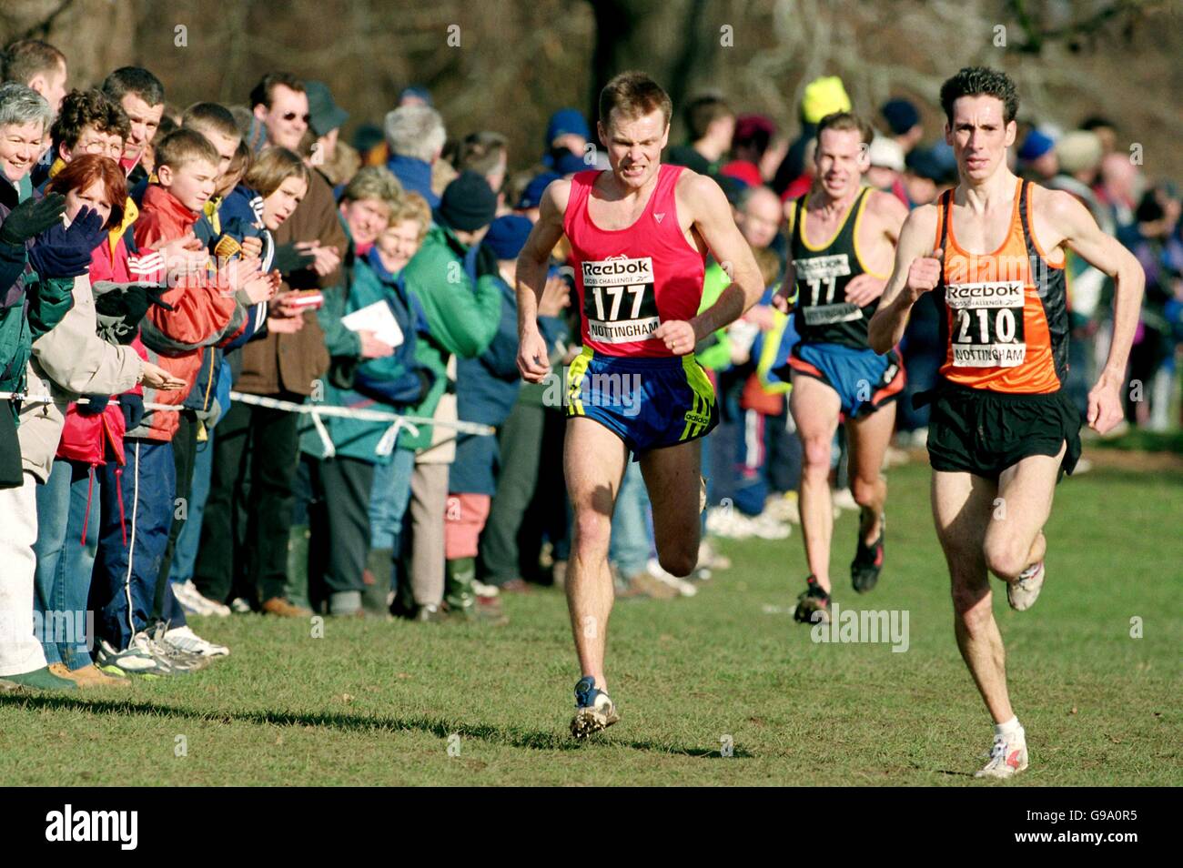 Athletics - Inter-Counties Championship/World Cross Country Trials - Nottingham. Rob Denmark (left) struggles home in the senior men's 12000m race at the cross country trials at Wollaton Park, Nottingham Stock Photo