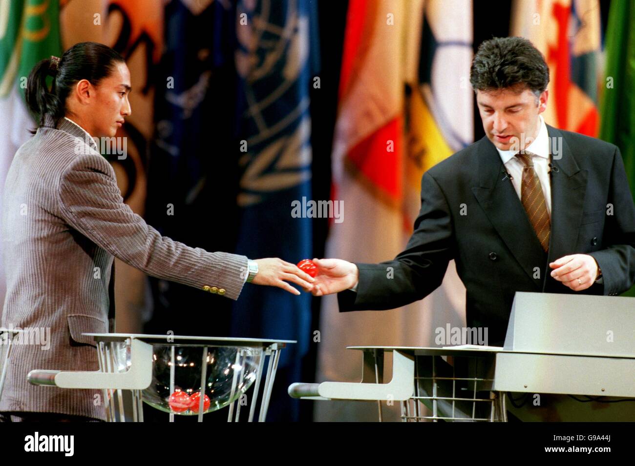 FIFA general secretary Michel Zen-Ruffinen is handed a ball by Ahn Jung Ham Stock Photo