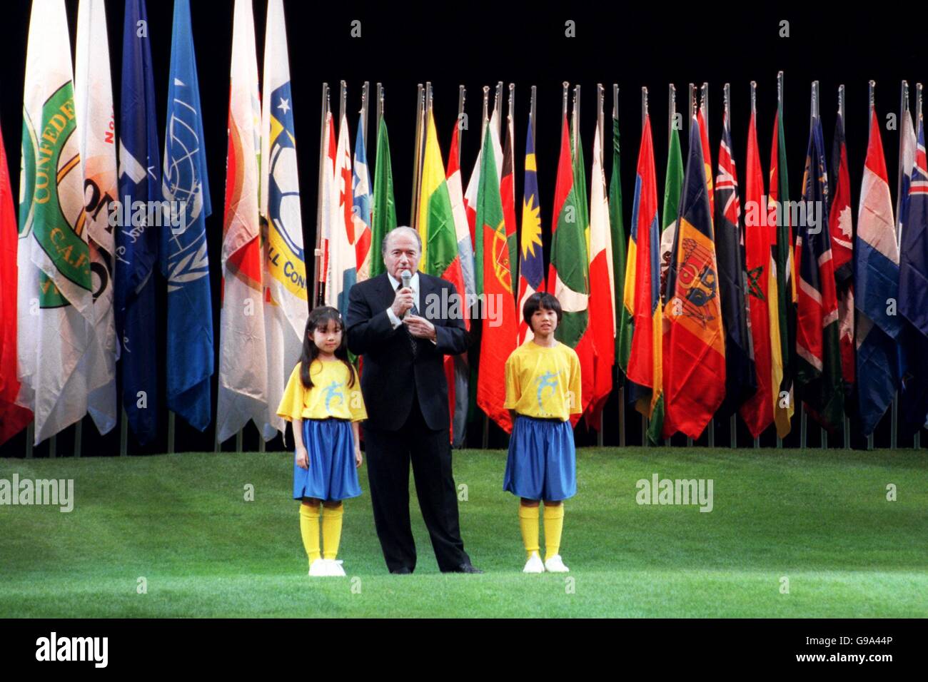 Soccer - FIFA World Cup 2002 - Preliminary Draw - Tokyo International Forum. FIFA president Sepp Blatter introduces the draw Stock Photo