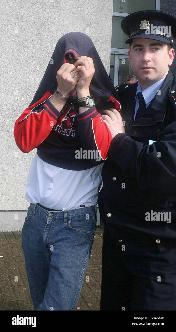 Thomas Maxwell, 43 of Stonehall, Multyfarnham Co Westmeath is led away from Longford District Court, where he was remanded in custody with consent to bail following his arrest in connection with the hijacking of a lorry carrying 300,000 euro worth of vodka. Stock Photo