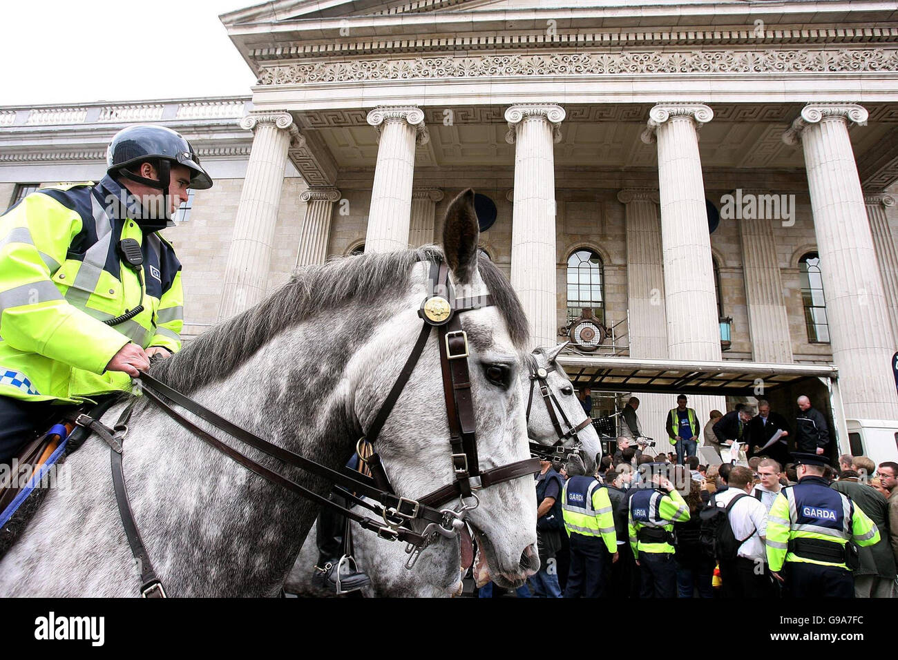 Mounted Gardai in front of the GPO building on O'Connell Street in Dublin ahead of tomorrow's