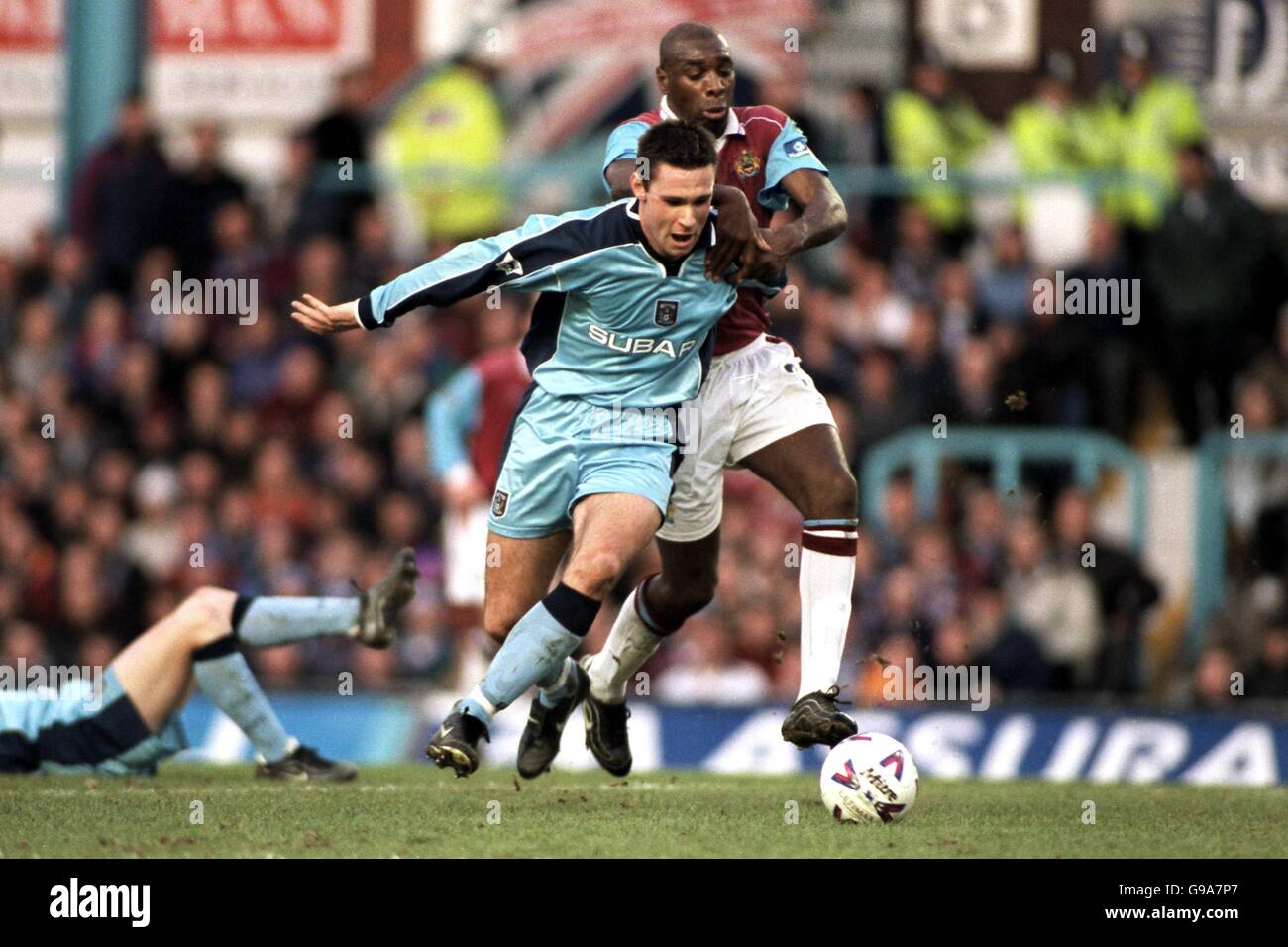 Coventry City's Cedric Roussel takes on Burnley's Mitchell Thomas Stock Photo