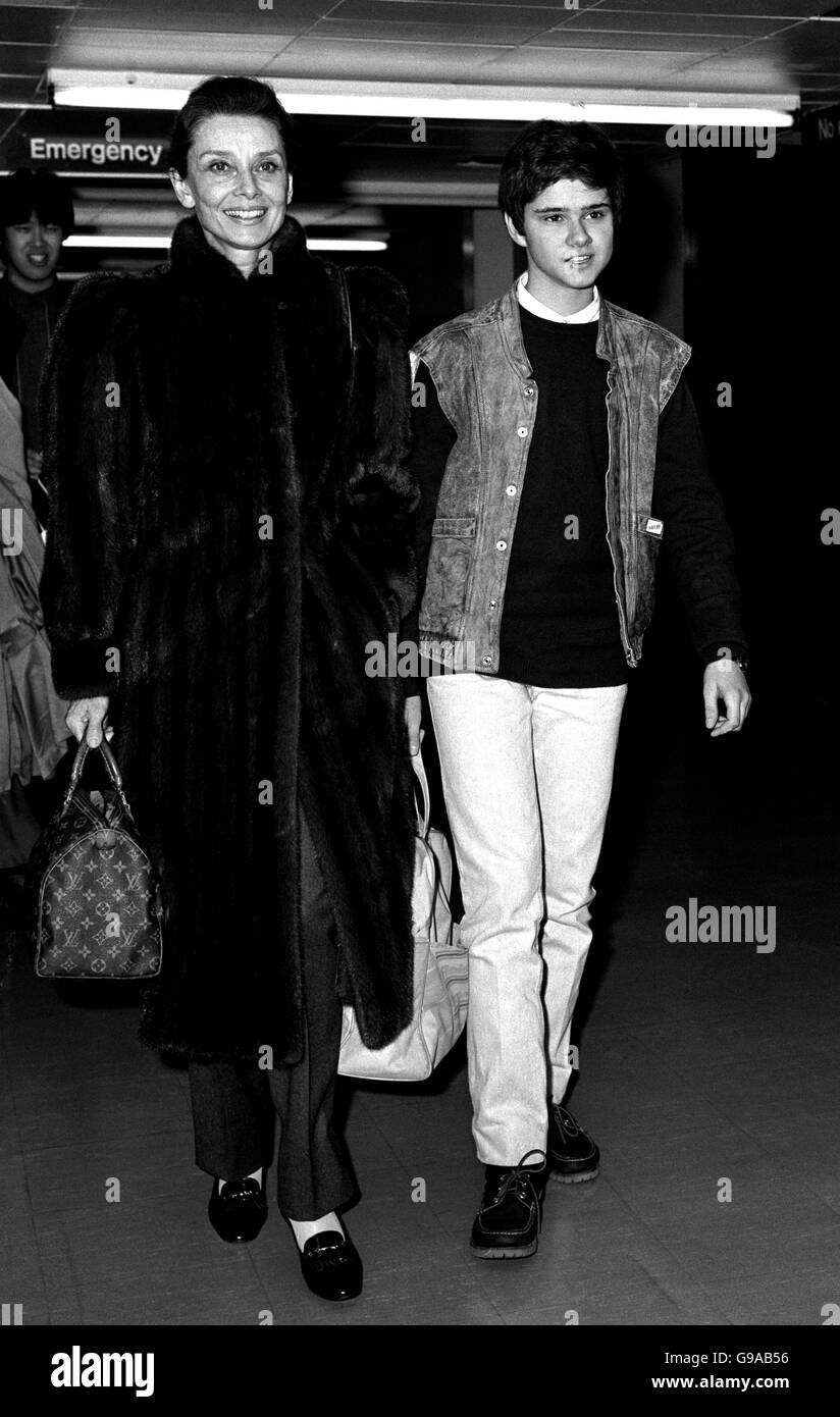Audrey Hepburn (55), and her son Luca Dotti (14), arriving at Heathrow airport, after their flight from Rome. Stock Photo