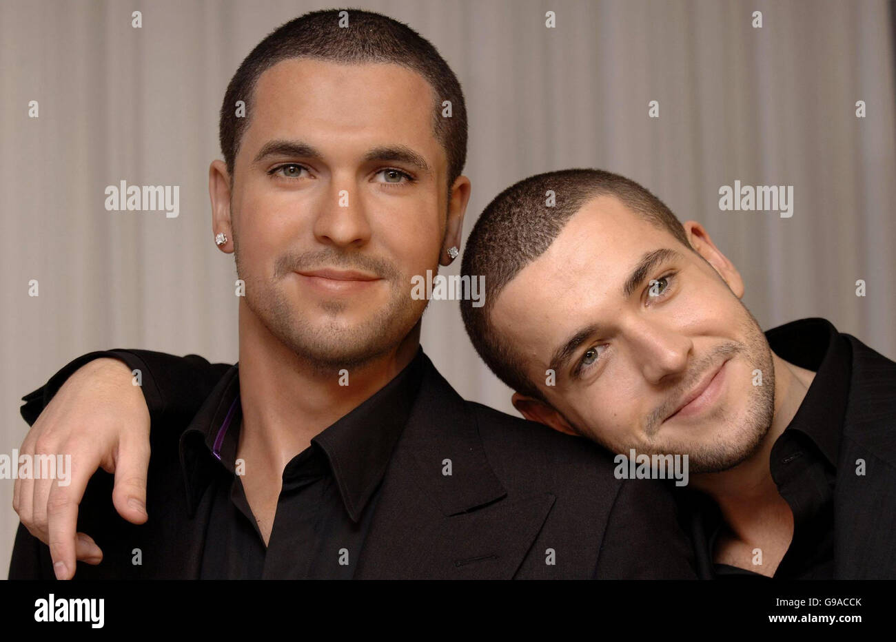 X Factor winner Shayne Ward (right) unveils his wax model at Madame Tussauds in central London. Stock Photo