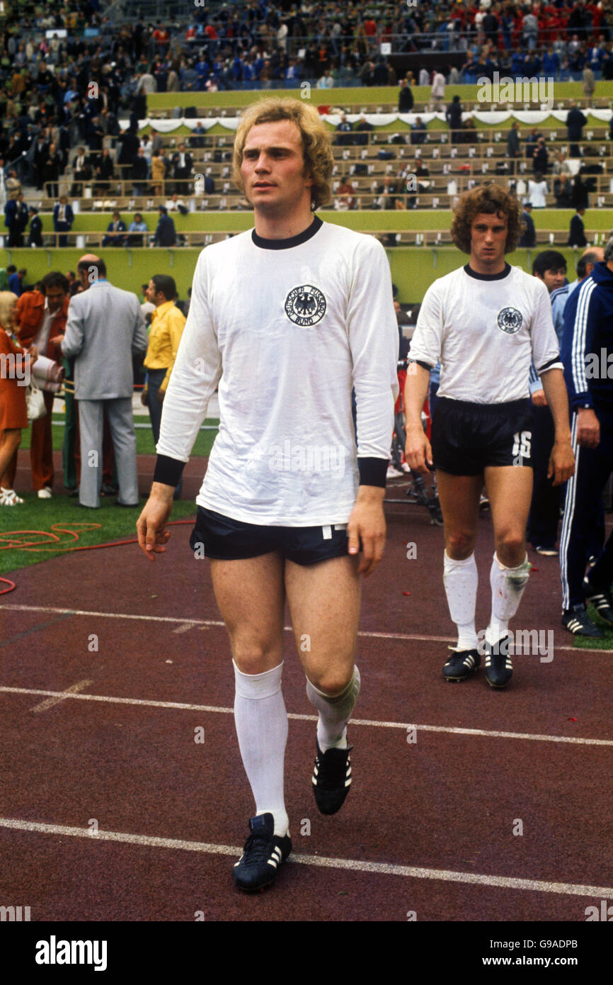 West Germany's Uli Hoeness (l) and Bernd Hoelzenbein (r) make their way on to the pitch. Stock Photo