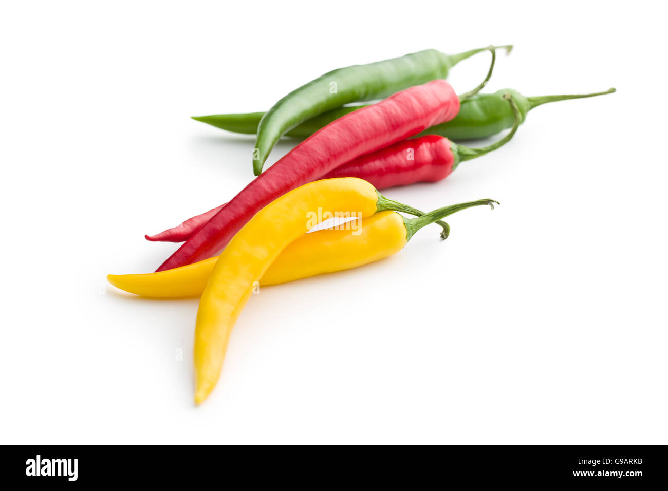 Different colors chilli peppers isolated on white background Stock ...