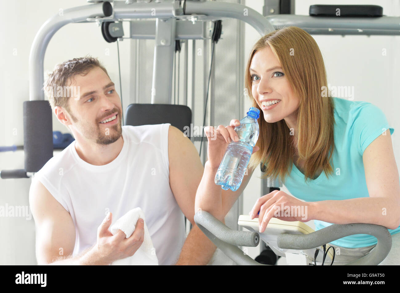 Attractive couple at the gym Stock Photo - Alamy