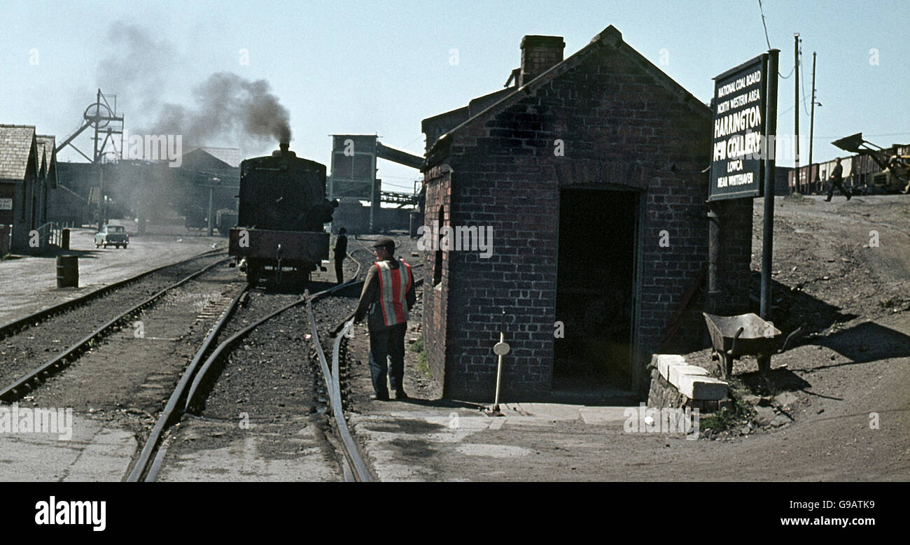 Harrington Colliery, Cumberland. Note the vintage high visibility vest, a feature almost unknown at the time. Stock Photo