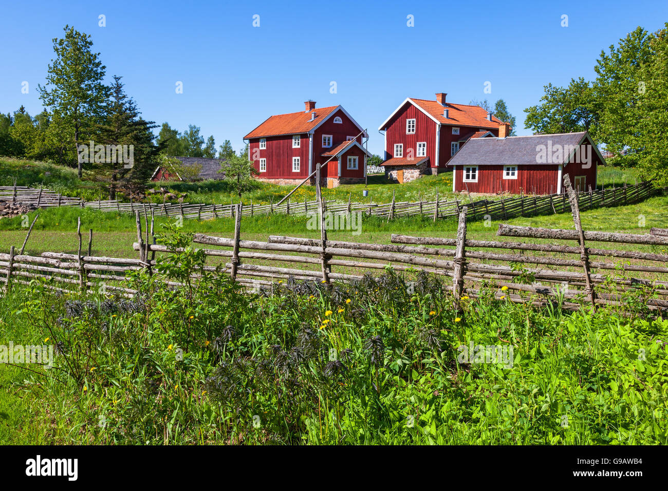 Old rural farm on a hill in the countryside Stock Photo