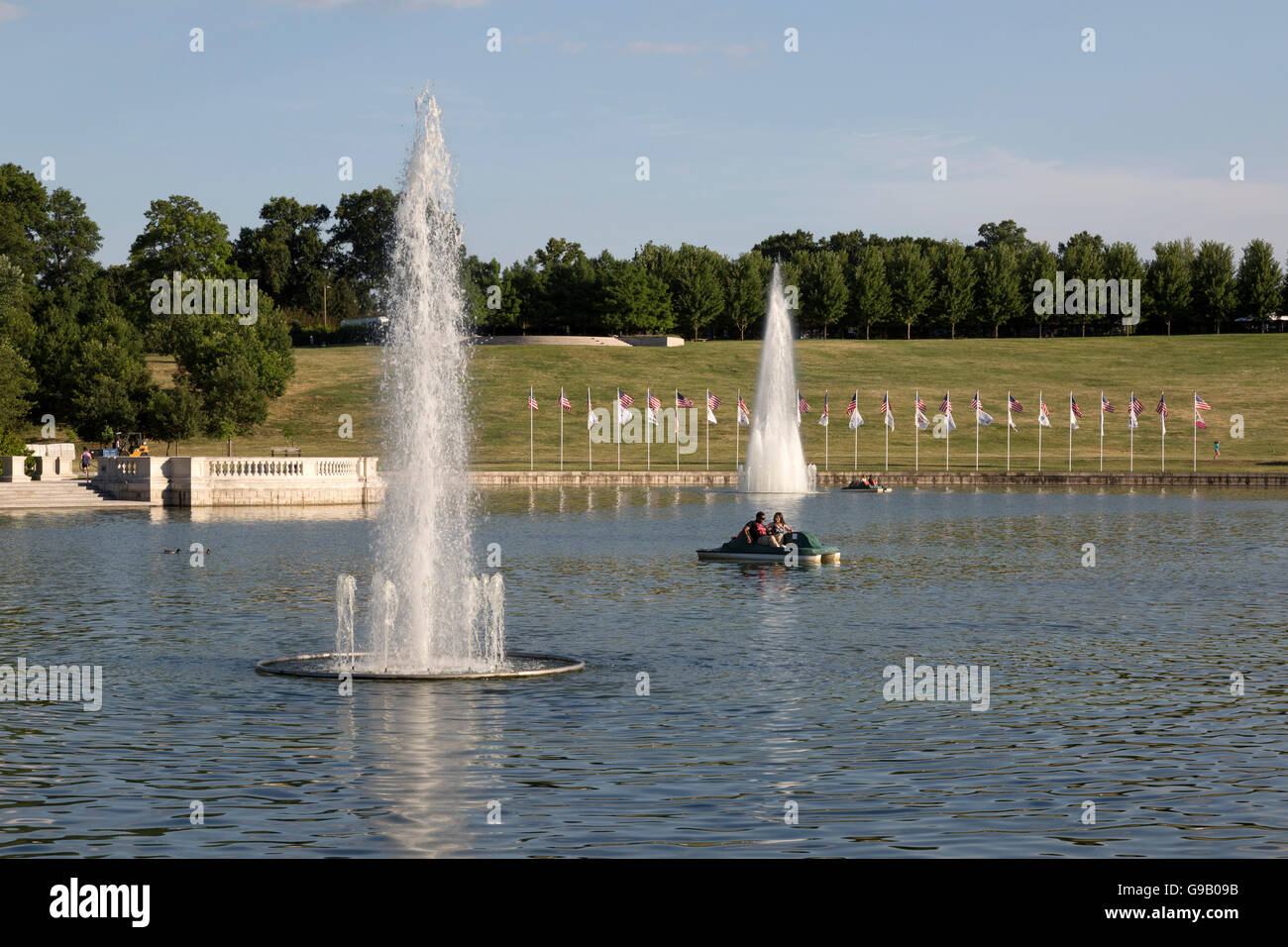 Paddle boating on lake with fountains. Located in St. Louis, Missouri, Forest Park Stock Photo
