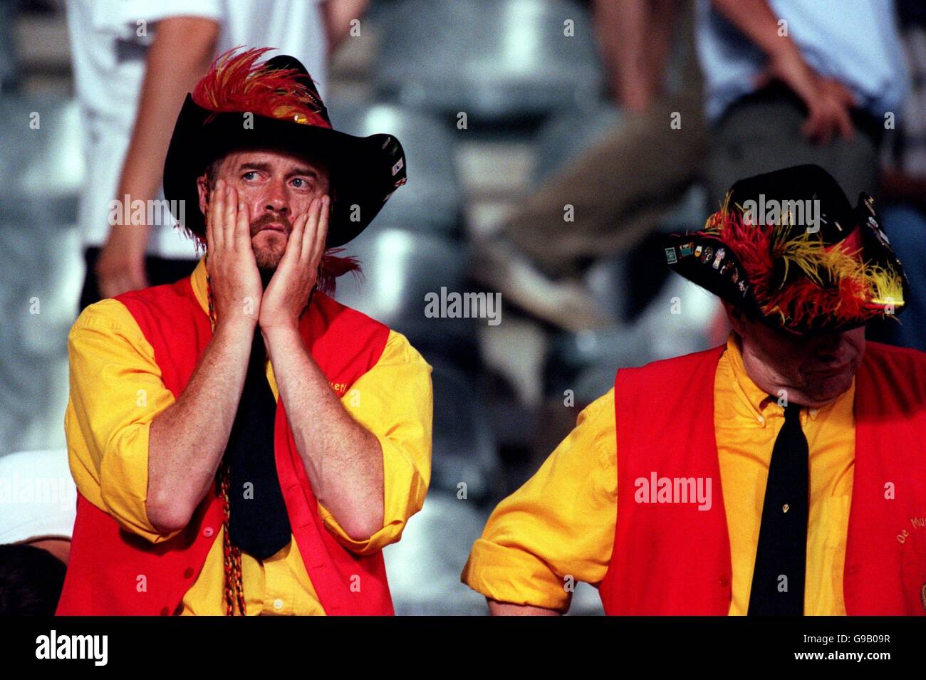 Sad Belgium fans after their defeat by Turkey knocked them out of Euro 2000 Stock Photo