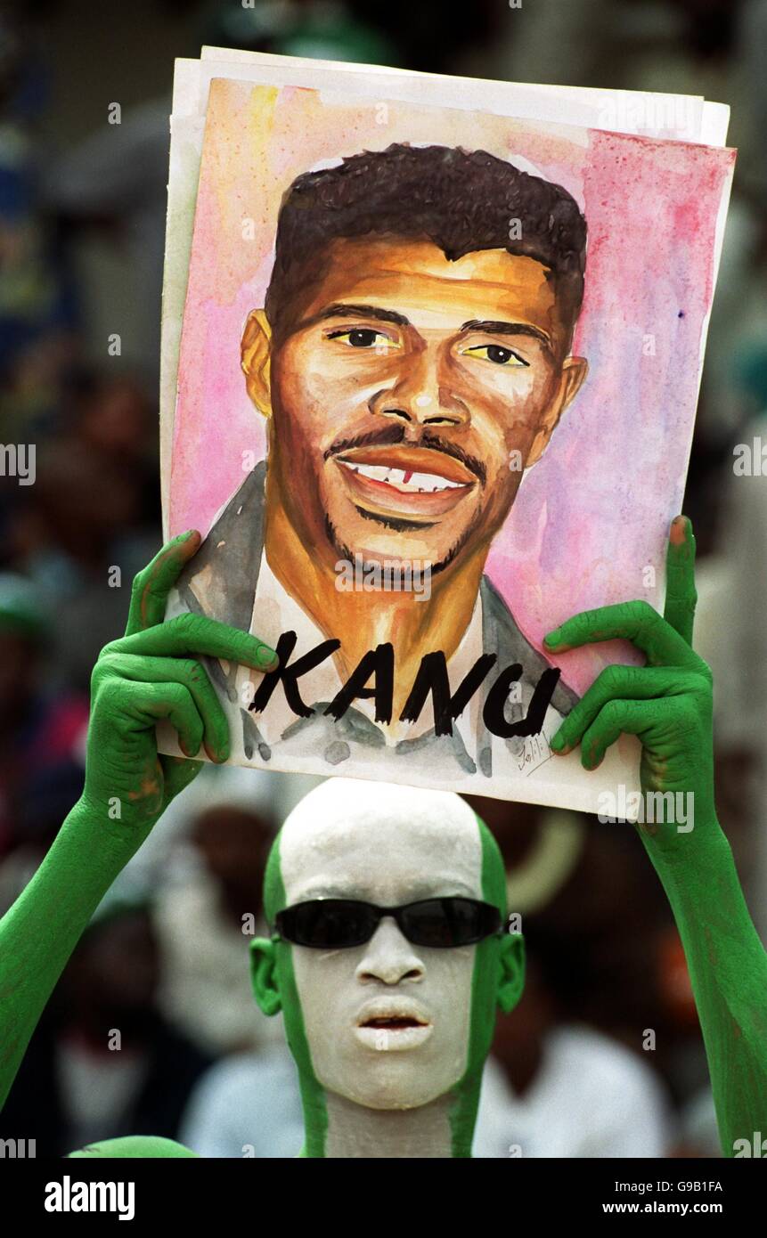 Soccer - African Nations Cup - Final - Nigeria v Cameroon. A Nigeria fan holds up a portrait of Nwankwo Kanu Stock Photo