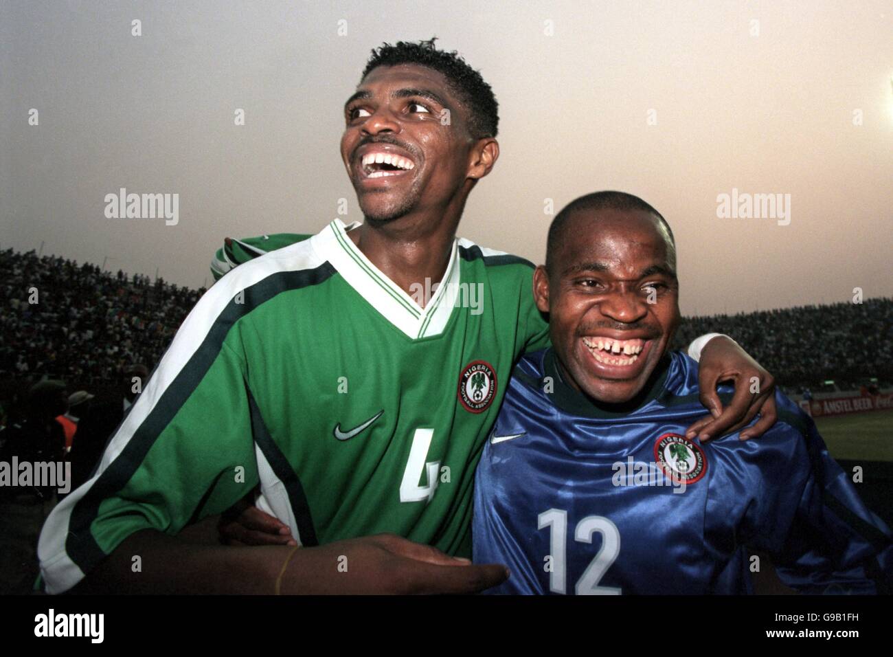 Nigeria's Nwankwo Kanu (l) and Ndubuisi Egbo (r) celebrate reaching the final of the Arican Nations Cup Stock Photo