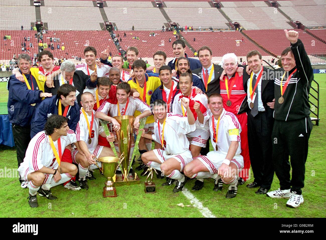 The Canadian team with the Gold Cup trophy that they won by defeating Colombia 2-0 in Los Angeles Stock Photo