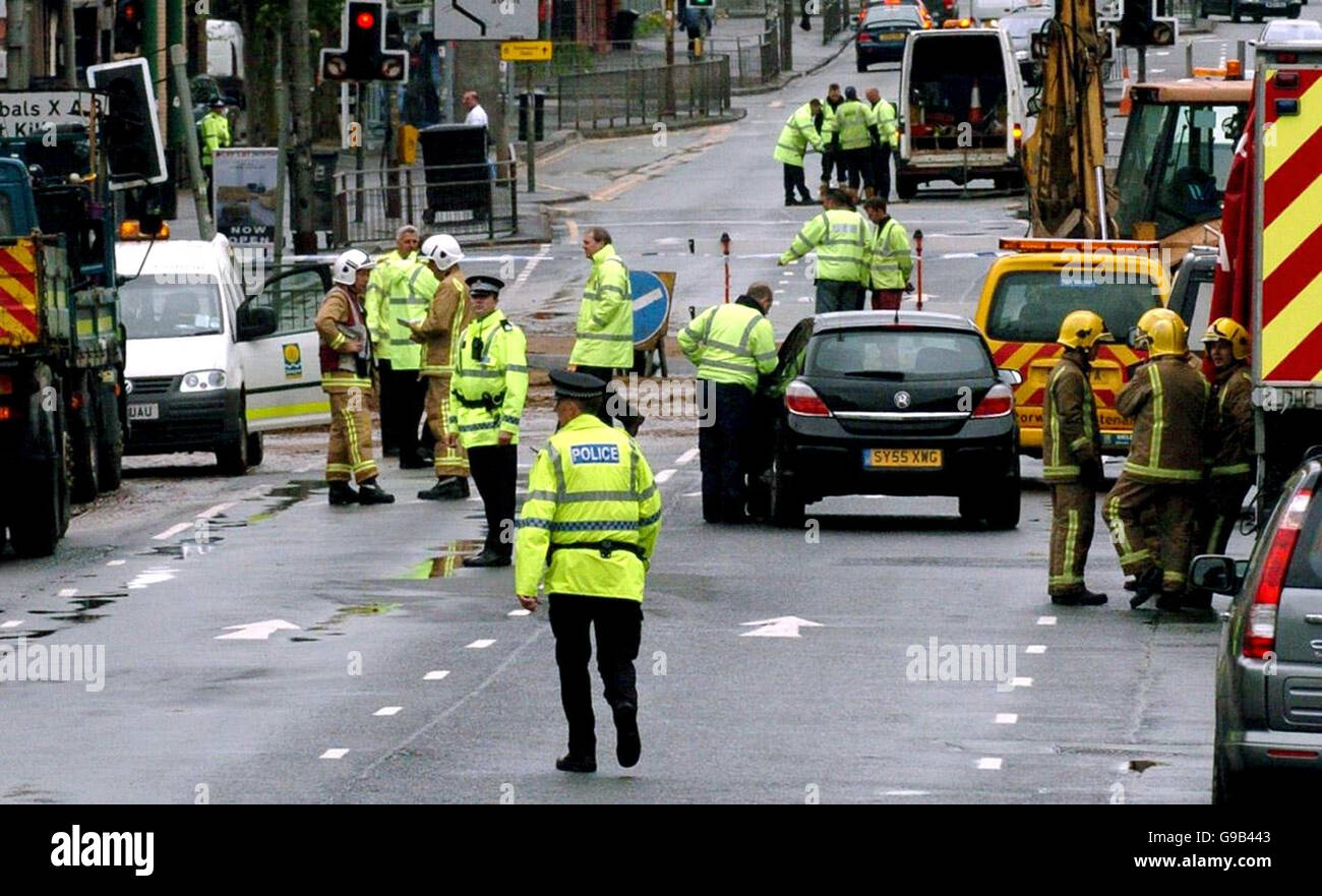 Police and fire crews seal off Bridge Street in Glasgow after a burst