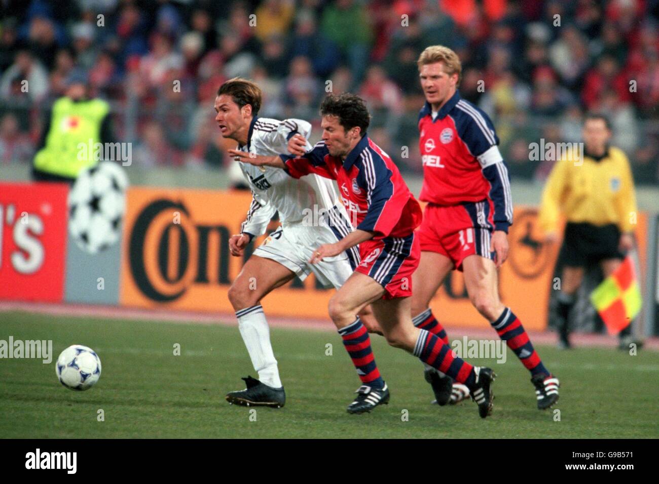 (L-R) Real Madrid's Fernando Redondo holds off the challenge of Bayern Munich's Lothar Matthaus Stock Photo