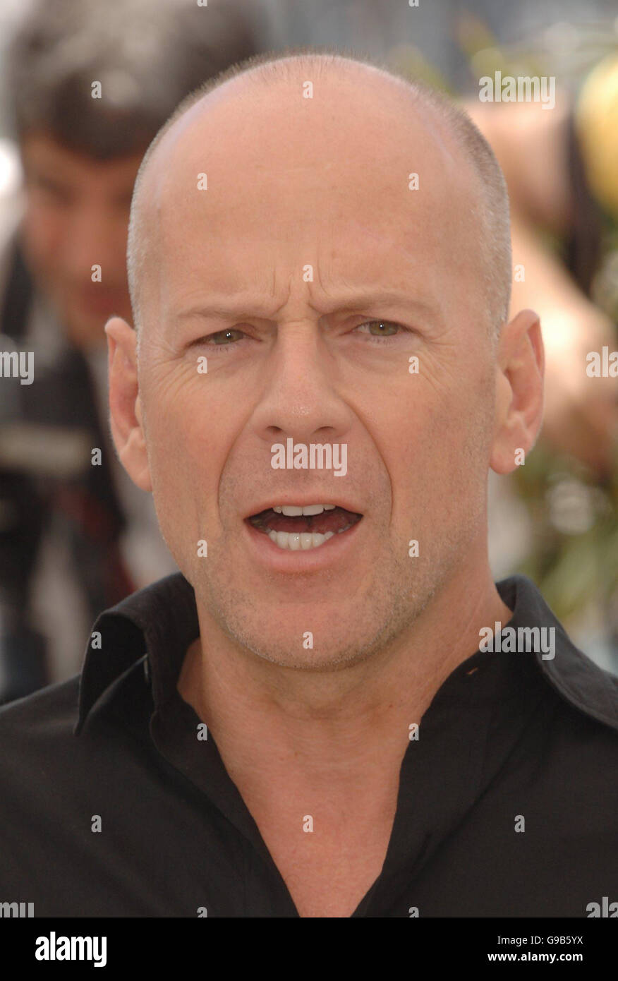 AP OUT. Bruce Willis,who provides the voice of RJ the Racoon, is seen at a p/call for his new film Over The Hedge, a new animated film from Dreamworks. He was seen on the terrace of the palais de Festival,in Cannes,France on Sunday 21st May 2006. Stock Photo