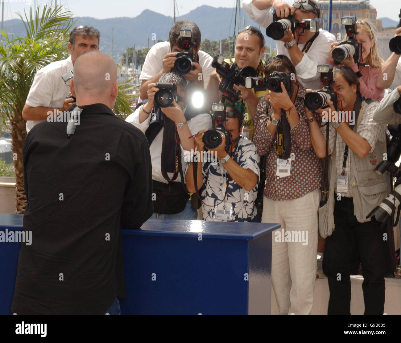 AP OUT. Bruce Willis,who provides the voice of RJ the Racoon, is seen at a p/call for his new film Over The Hedge , a new animated film from Dreamworks. He was seen on the terrace of the palais de Festival,in Cannes,France on Sunday 21st May 2006. Stock Photo