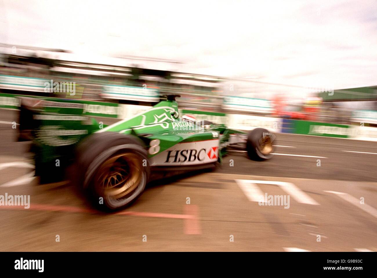 Johnny Herbert leaves the Jaguar garage on his way to setting 14th fastest time in qualifying Stock Photo