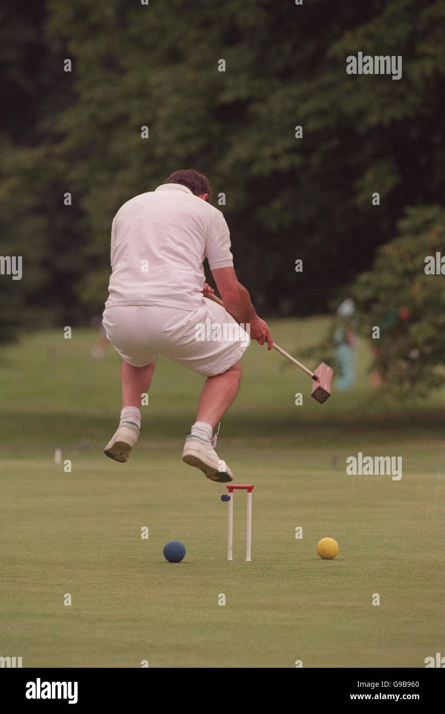 Library filer dated 21/7/1991 of a man playing croquet. Croquet's popular image is as a genteel, sedate pastime favoured by geriatrics and the infirm. But in reality it can be every bit as fiendishly tactical and cut-throat as the political world that is John Prescott's more familiar habitat. Stock Photo