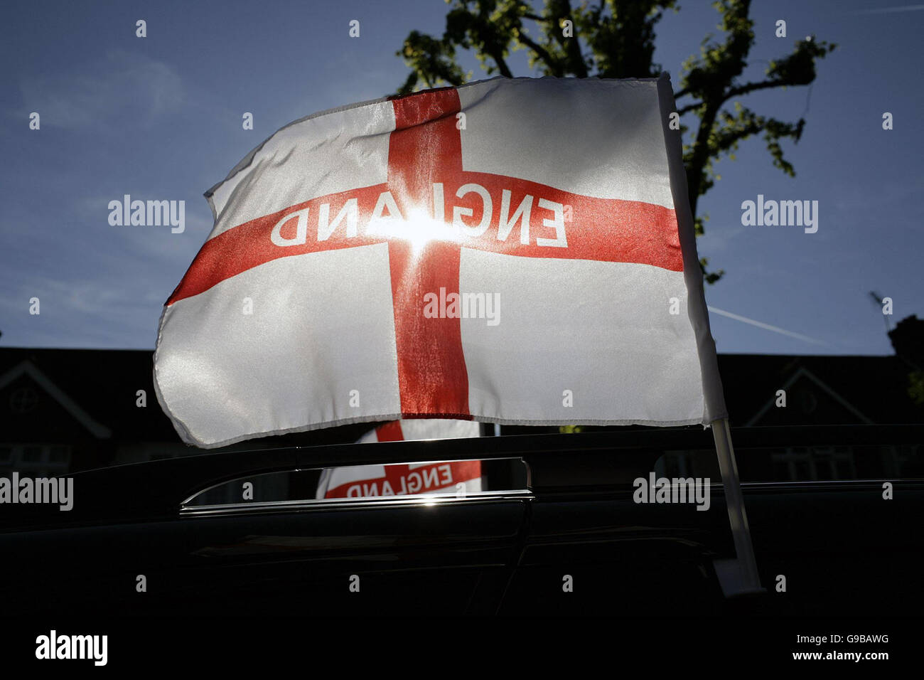 A car adorned with a St George flag during the build up to the FIFA World Cup. Stock Photo