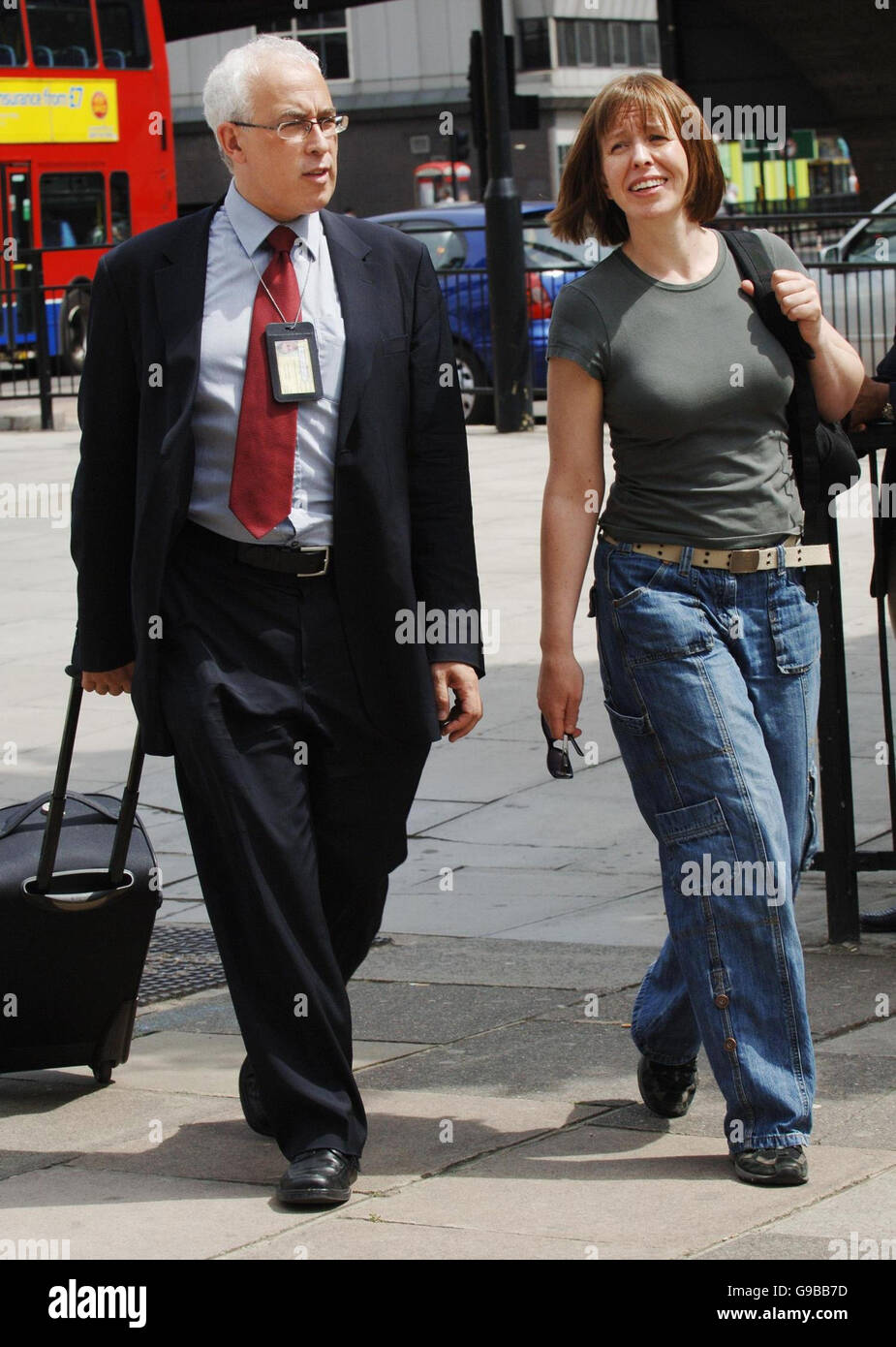 Julian Young and Kate Roxburgh respective solicitors for east London terrorist suspect brothers Abul Koyair Kalam and Abdul Kahar Kalam, outside Paddington Green police station, London, where police are interviewing them. Stock Photo