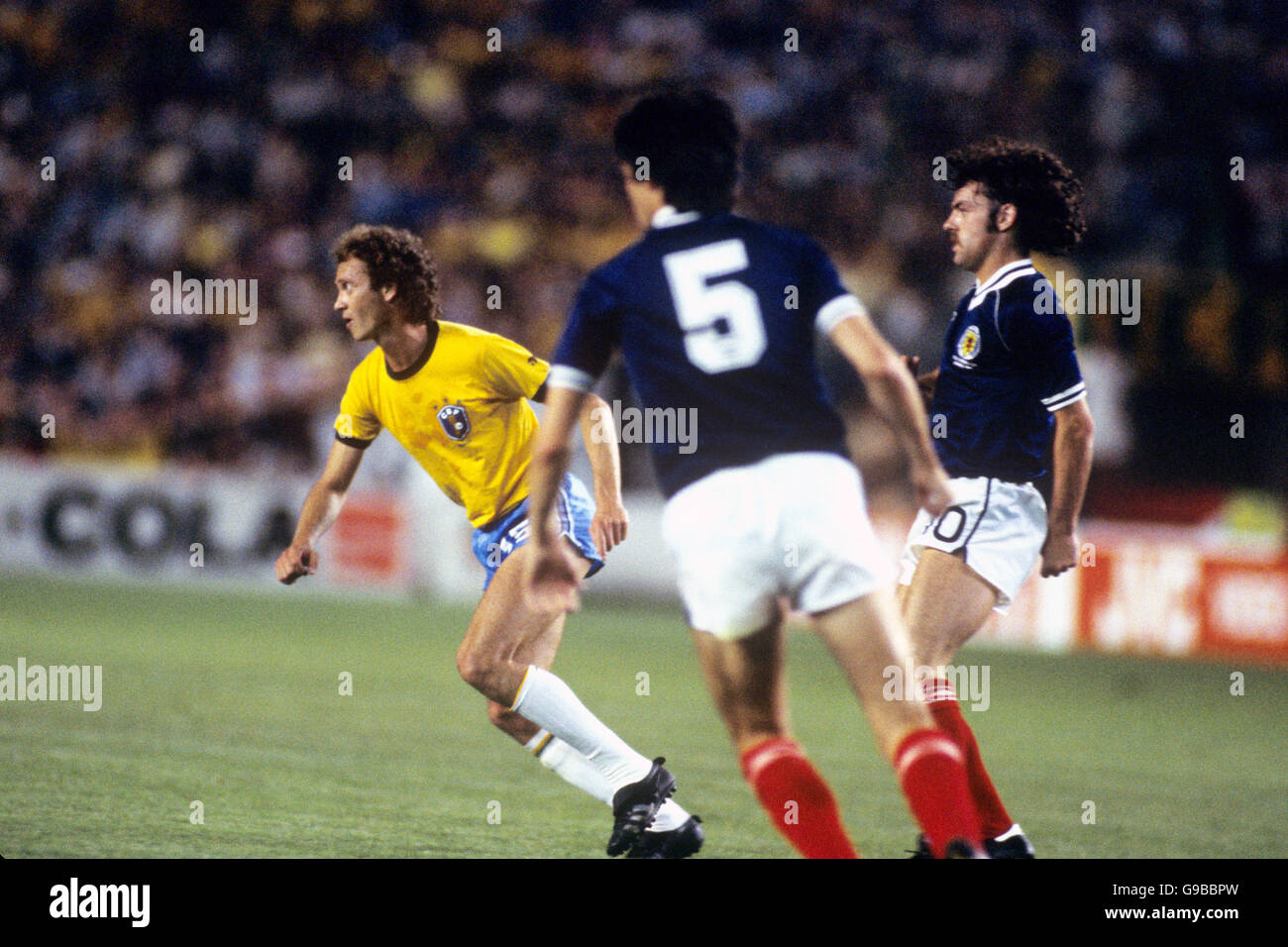 Scotland's John Wark in action (r) with Brazil's Falcao (l) Stock Photo