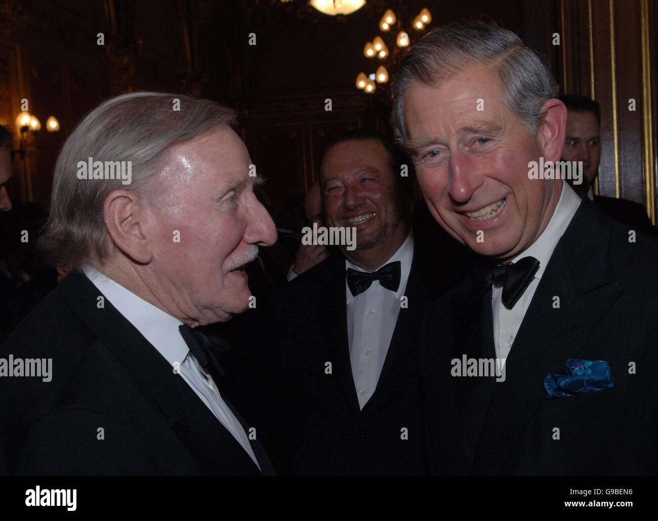 The Prince of Wales chats with actor Leslie Phillips at the Royal Shakespeare Company's gala fund raising dinner for their 'Complete Works Festival', in London. Stock Photo
