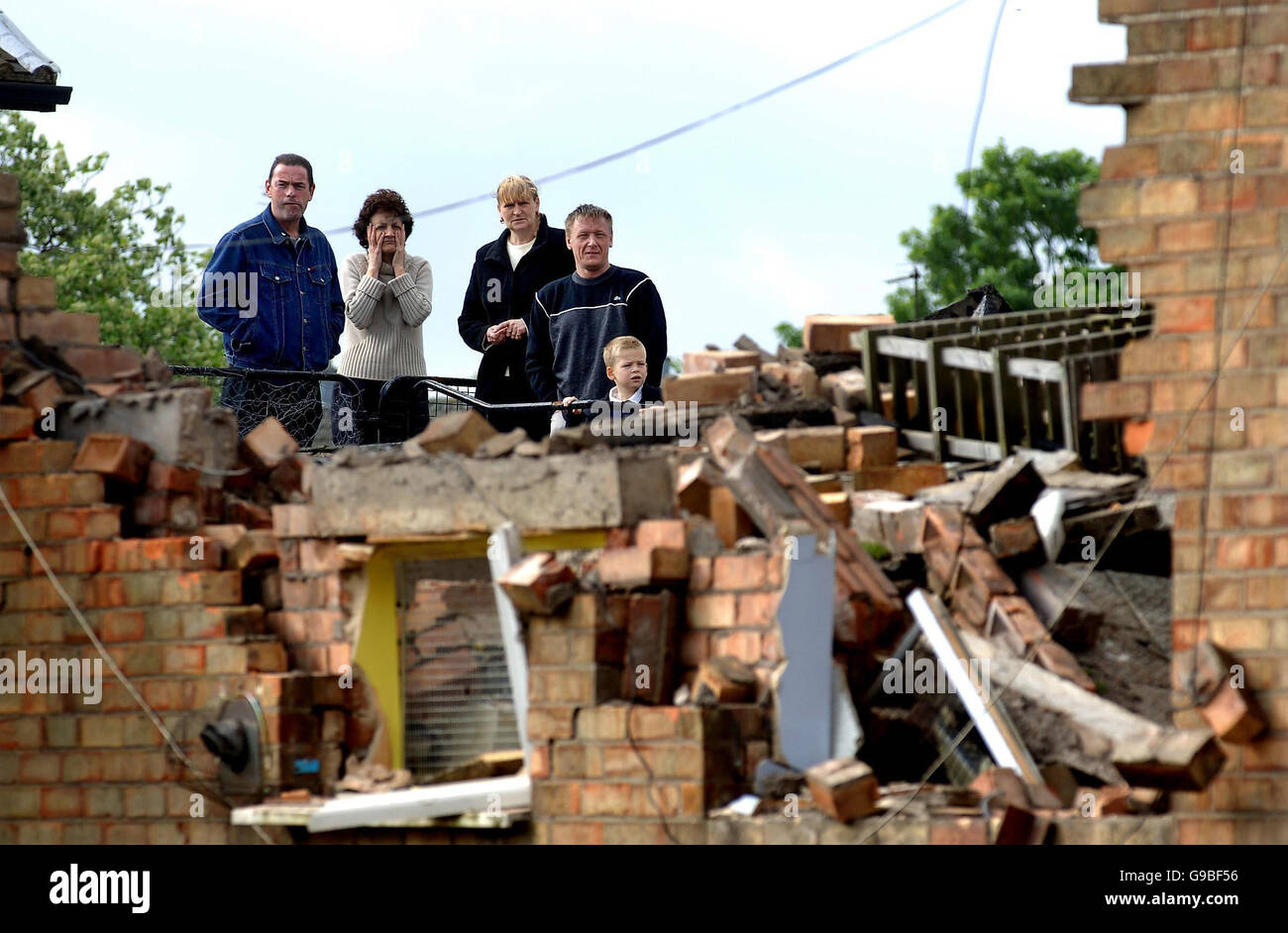 Spectators look at the aftermath of an explosion in a kebab shop in Hull, which is thought to have been caused by a gas leak. Stock Photo