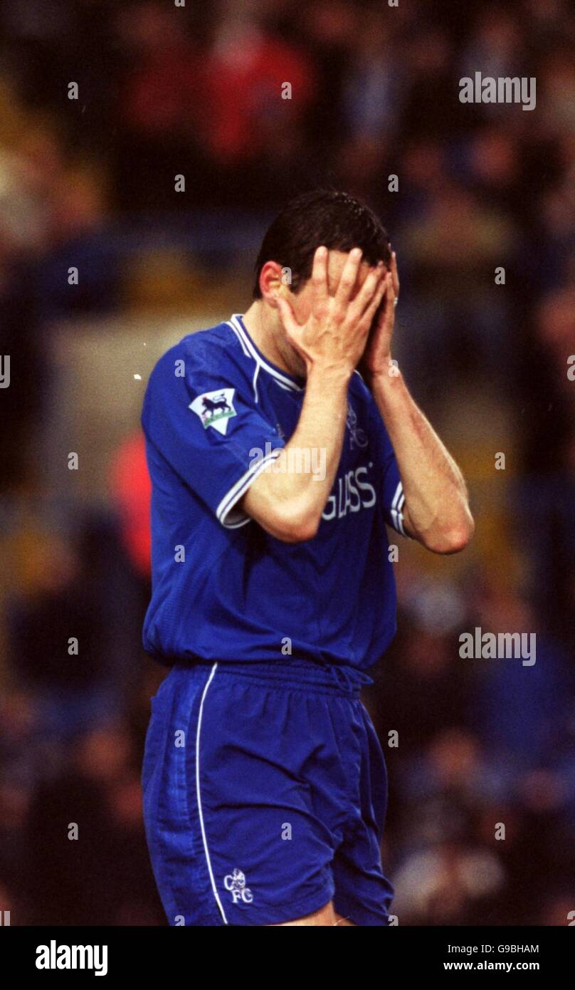 Chelsea's Gustavo Poyet holds his head in frustration after missing his shot at goal Stock Photo