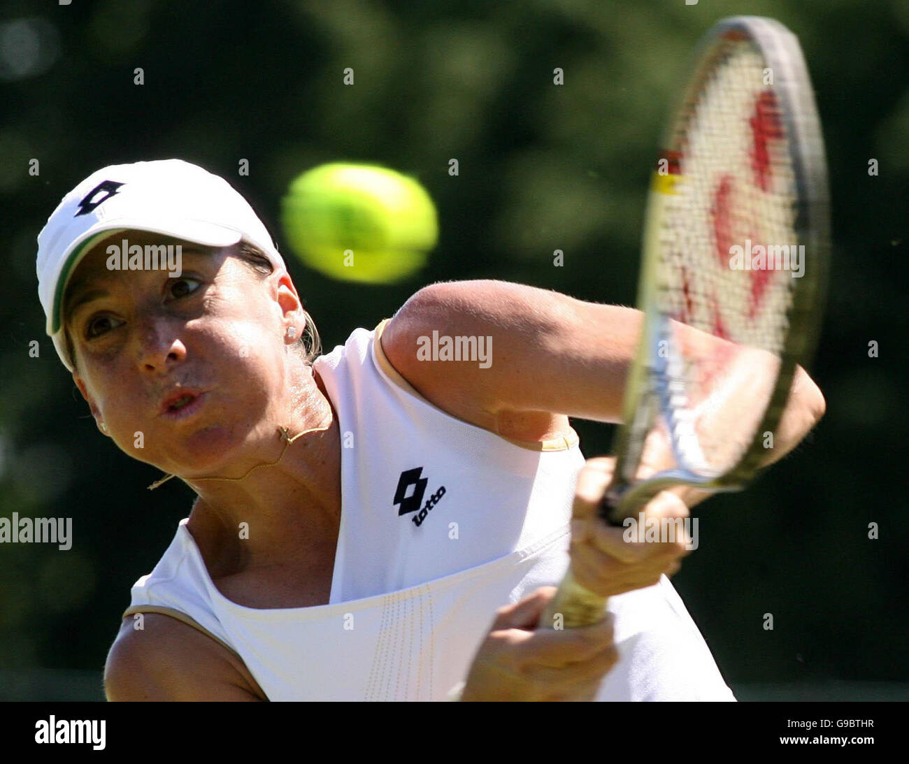 Puerto Rico's Kristina Brandi returns a serve from USA's Laura Granville during the Surbiton Trophy final at Surbiton Racket and Fitness Club, London. Stock Photo