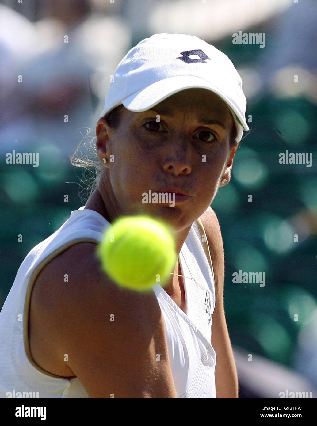 Puerto Rico's Kristina Brandi returns a serve from USA's Laura Granville during the Surbiton Trophy final at Surbiton Racket and Fitness Club, London. Stock Photo
