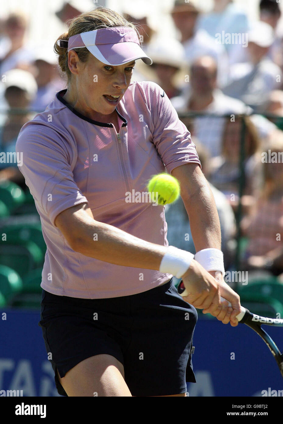 USA's Laura Granville returns a serve from Puerto Rico's Kristina Brandi during the Surbiton Trophy final at Surbiton Racket and Fitness Club, London. Stock Photo