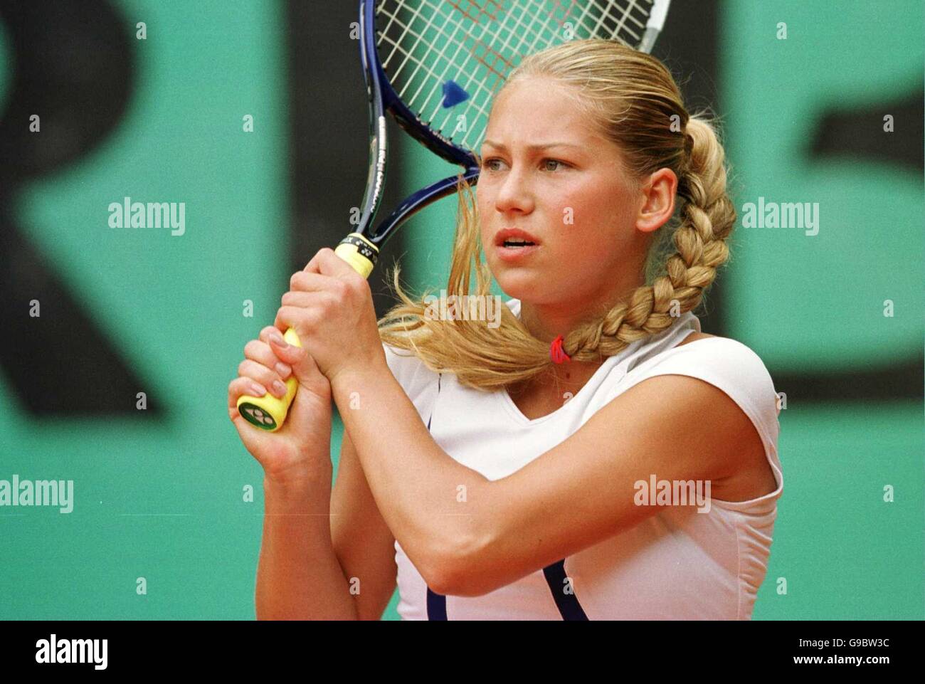 Tennis - French Open Roland Garros 2000. Anna Kournikova watches another return go wide as she is beaten by Silvia Plischke Stock Photo