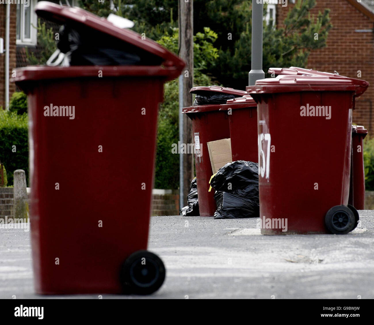 Rubbish bins full hi-res stock photography and images - Alamy