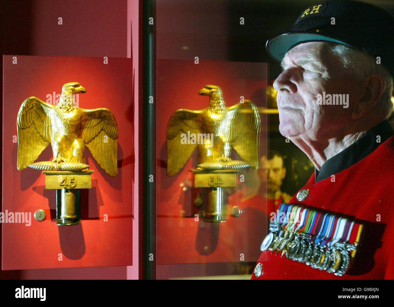 chelsea pensioner bill cross 89 looks at the french eagle standard G9BXJN