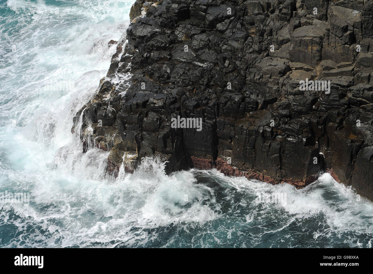 Waves crashing volcanic shoreline hi-res stock photography and images ...