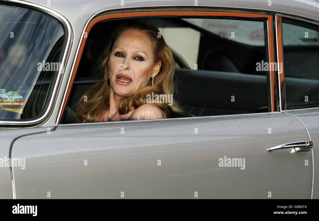 Ursula Andress arrives in the original James Bond Aston Martin DB5 from 'Goldfinger' at the Royal Yacht Britannia in Edinburgh to celebrate her Birthday. The occasion also marks the opnening of the Swiss Consulate General in Edinburgh. Stock Photo