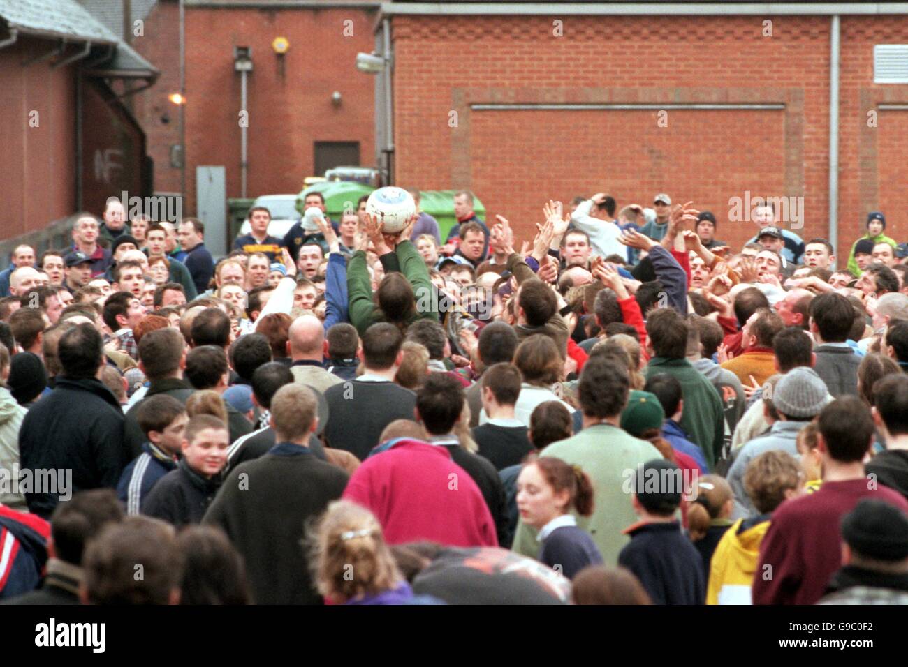 Annual Shrovetide Football Match - Ashbourne - Day One Stock Photo