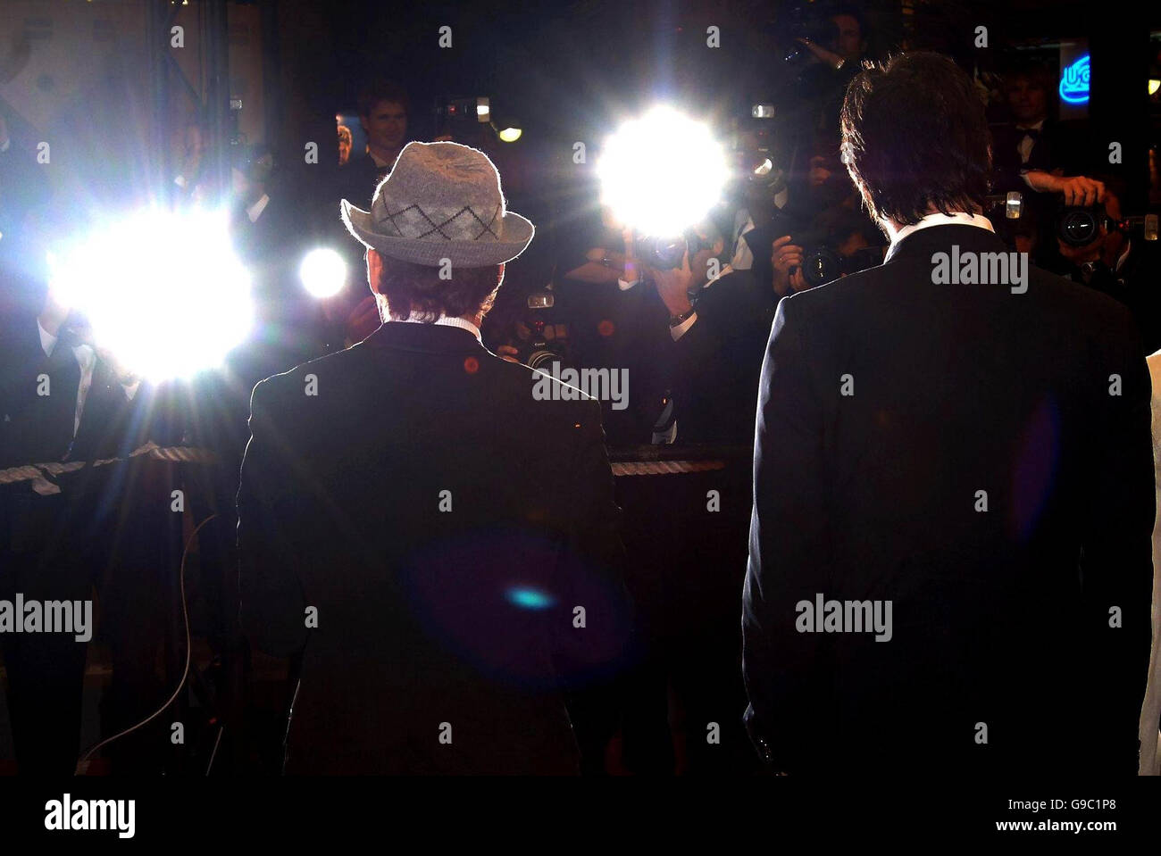 AP OUT: Robert Downey Jnr (left) and Keanu Reeves arrive at the premiere of A Scanner Darkly, at the Festival des Palais, Cannes, France. Stock Photo