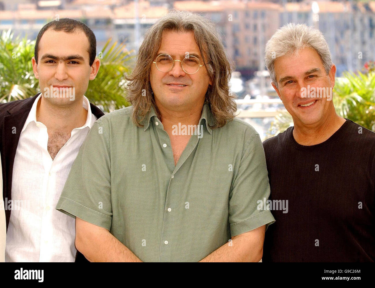 AP OUT: (Left to Right) Actor Khalid Abdalla, Director Paul Greengrass and Ben Sliney pose for photographers during the photocall for United 93, at the Riviera Terrace in the Palais du Festival during the 59th Cannes film Festival, in France. Stock Photo