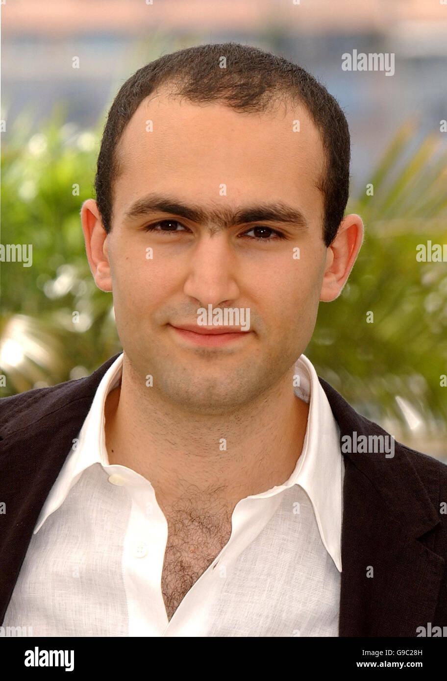Actor Khalid Abdalla, who plays one of the terrorists poses for photographers during the photocall for United 93, at the Riviera Terrace in the Palais du Festival during the 59th Cannes film Festival, in France. Stock Photo