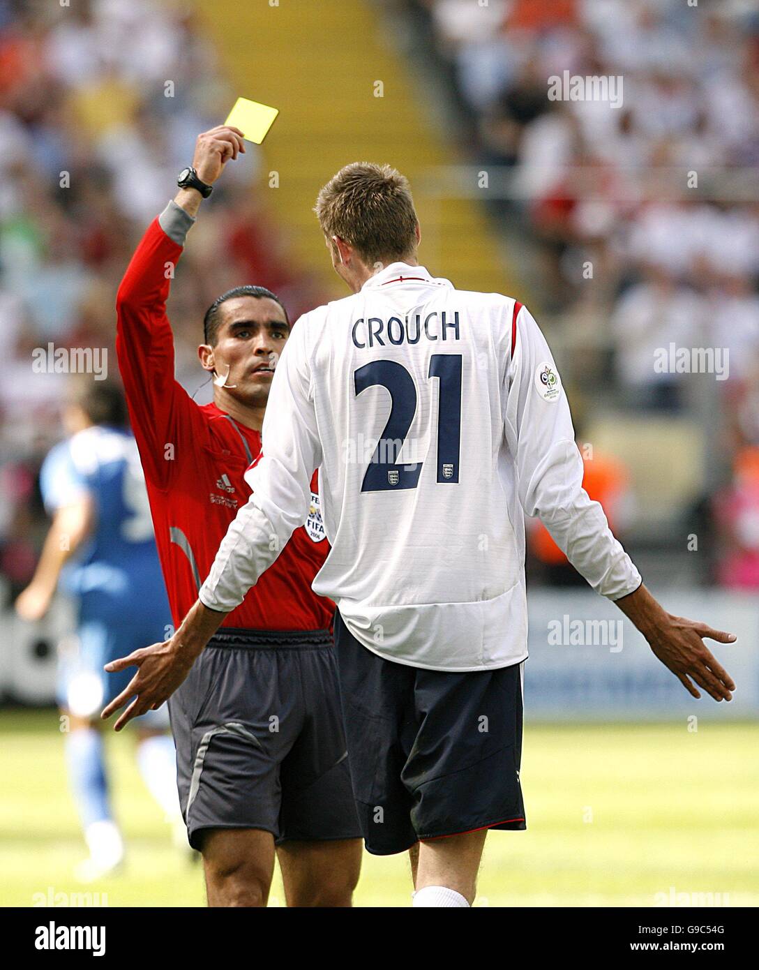 Peter Crouch is booked for dissent by referee Marco Rodriguez. Stock Photo