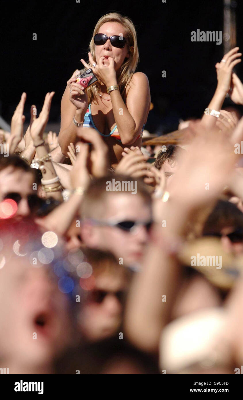 The crowd watching The Kooks performing during the annual Isle of Wight festival at Seaclose Park in Newport, Isle of Wight. Stock Photo