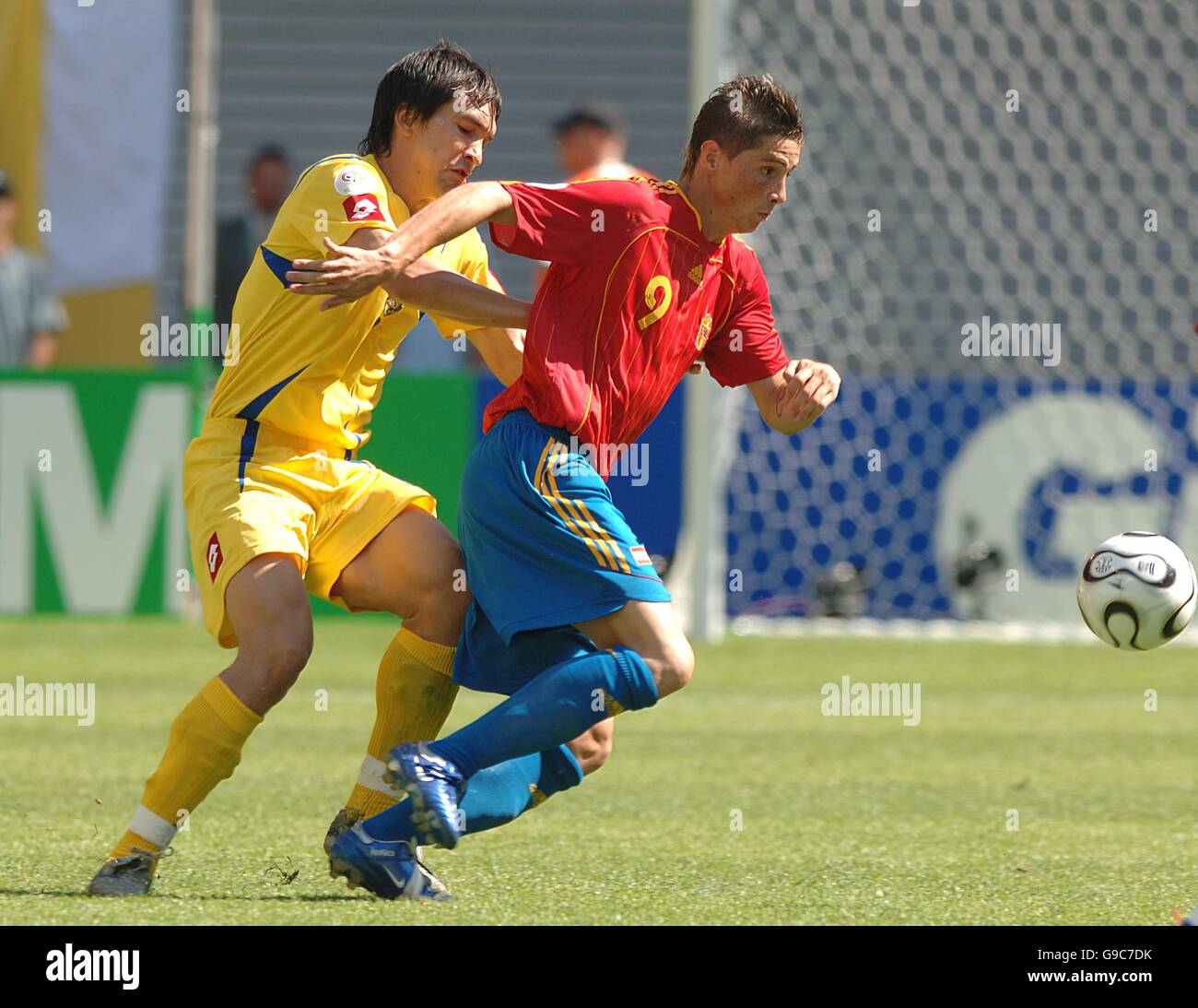 Ukraine's Andriy Rusol challenges Spain's Fernando Torres Stock Photo